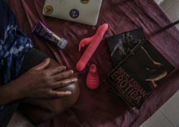 GHANA, ACCRA - Nana Darkoa shows off some of her toys and erotic novels. CREDIT: Yagazie Emezi