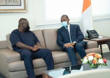 Mr Francis Asenso-Boakye, Minister for Works and Housing (left0 and Mr Bruno Nabagné Koné, the Minister for Construction, Housing and Urban Planning
