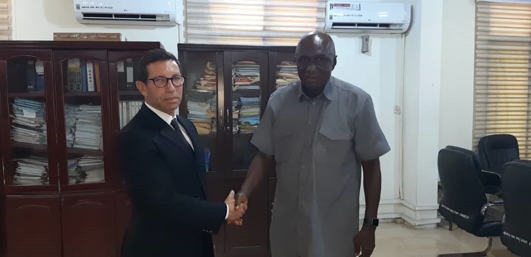 Minister for the Interior, Ambrose Dery (Right) in a handshake with the Ambassador of the Czech Republic to Ghana, Jan Fury